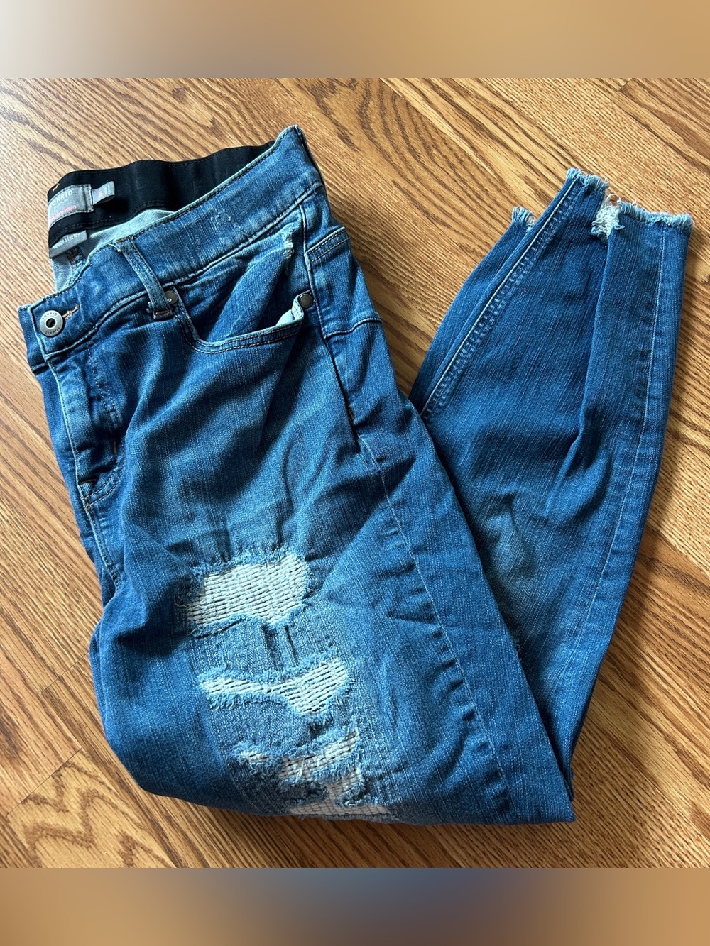 TORRID bombshell skinny distressed jeans